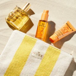 Nuxe Pochette essenziali estate - Kit con solari e olio per la protezione e l'idratazione, 3 pezzi